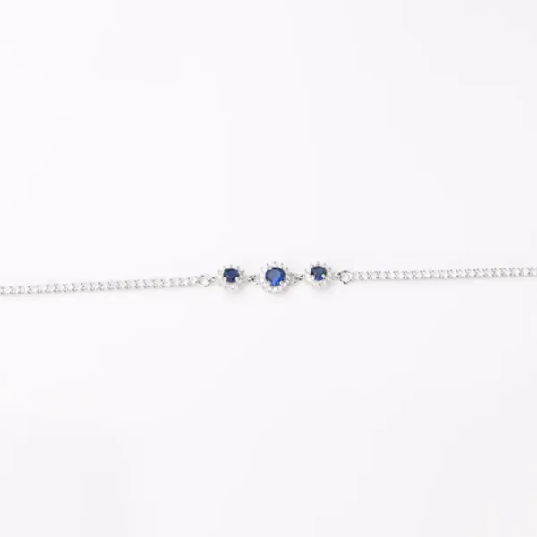 Delicate 925 silver tennis bracelet with three sapphire-inspired crystals surrounded by cubic zirconia, elegant floral design