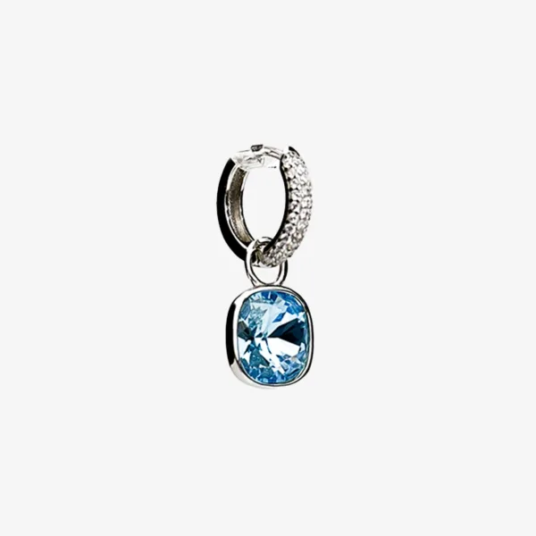 A single silver hoop earring with a small diamond-encrusted hoop at the top and a larger, light blue cushion-cut gemstone dangling below.