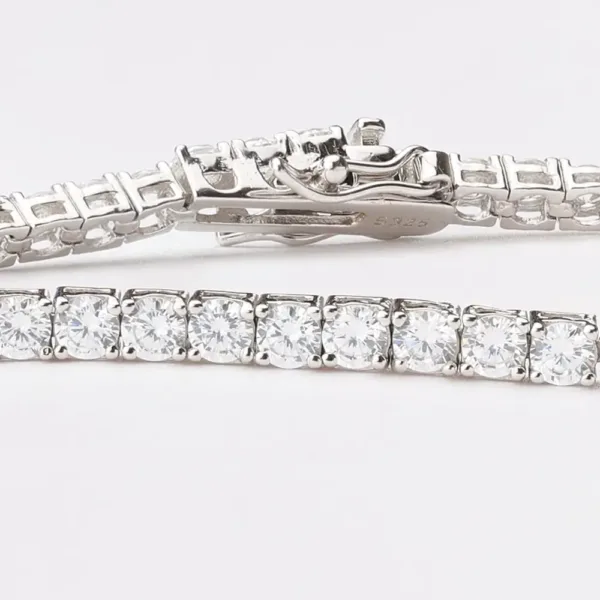 A classic sterling silver tennis bracelet featuring a continuous line of sparkling round-cut cubic zirconia.