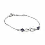 Sterling silver infinity bracelet with amethyst stones, front view