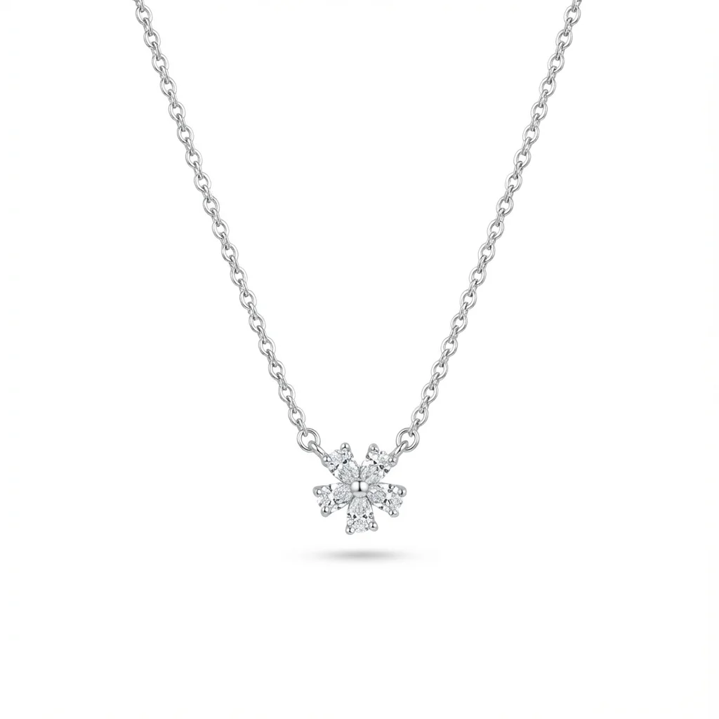 Sterling silver snowflake pendant on delicate chain, front view
