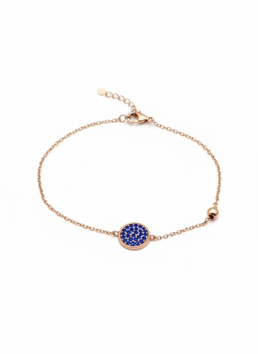 Rose gold-plated sterling silver bracelet with blue enamel charm, top view