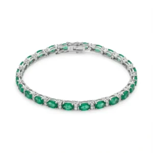 Sterling silver tennis bracelet with emerald gemstones, top view