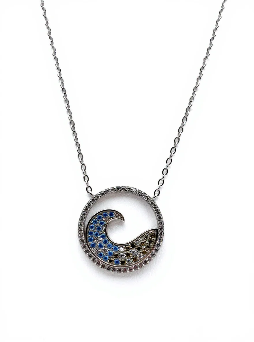 Sterling silver wave pendant necklace with blue accents, front view