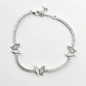 Sterling silver tennis bracelet with butterfly charms, top view
