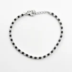 Sterling silver tennis bracelet with black and white cubic zirconia, top view