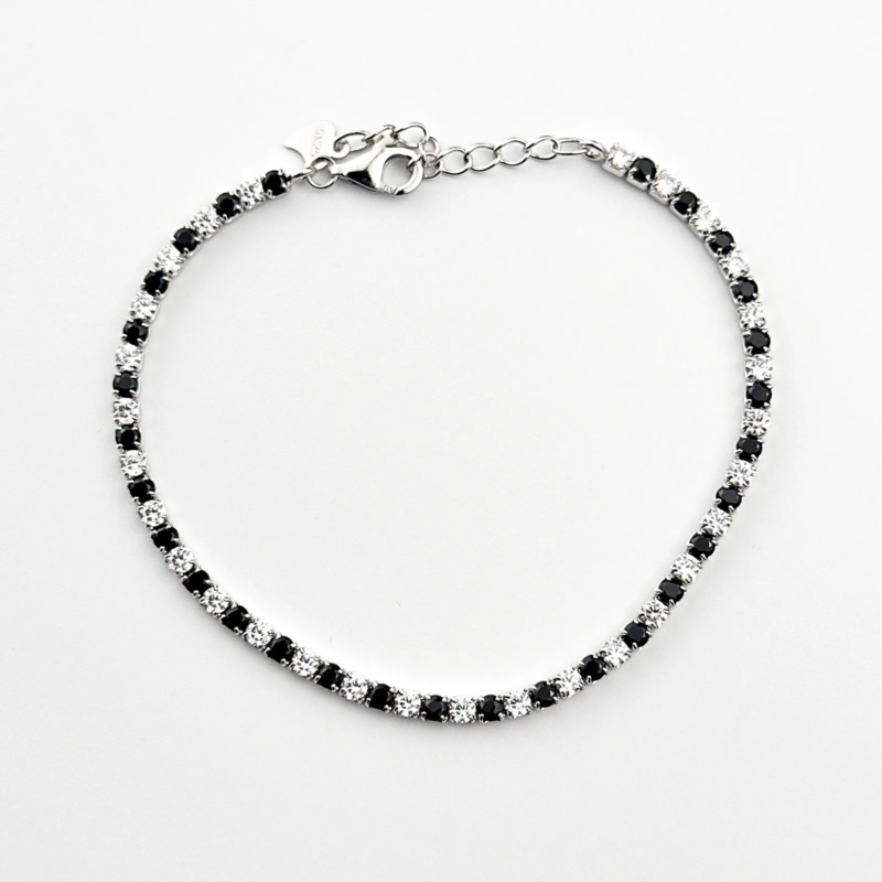 Sterling silver tennis bracelet with black and white cubic zirconia, top view