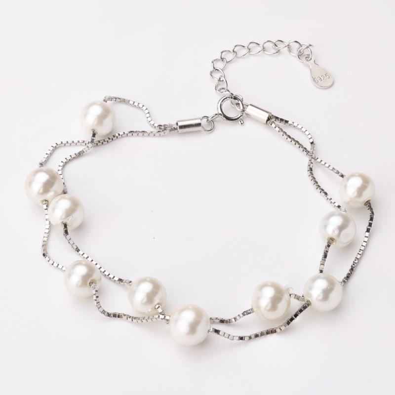 Sterling silver double-strand pearl bracelet with adjustable chain, front view