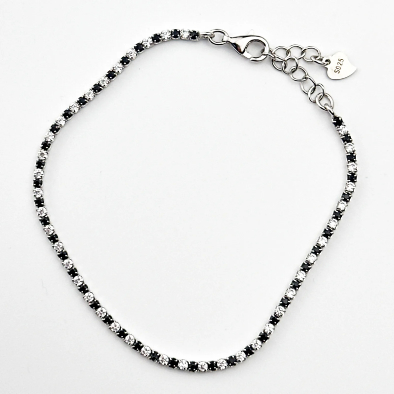 Sterling silver tennis bracelet with black and white cubic zirconia, top view