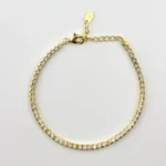 Gold-plated sterling silver tennis bracelet with square cubic zirconia, top view