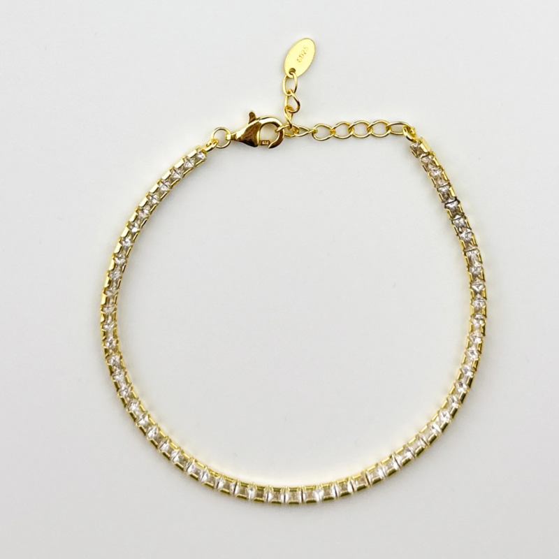 Gold-plated sterling silver tennis bracelet with square cubic zirconia, top view