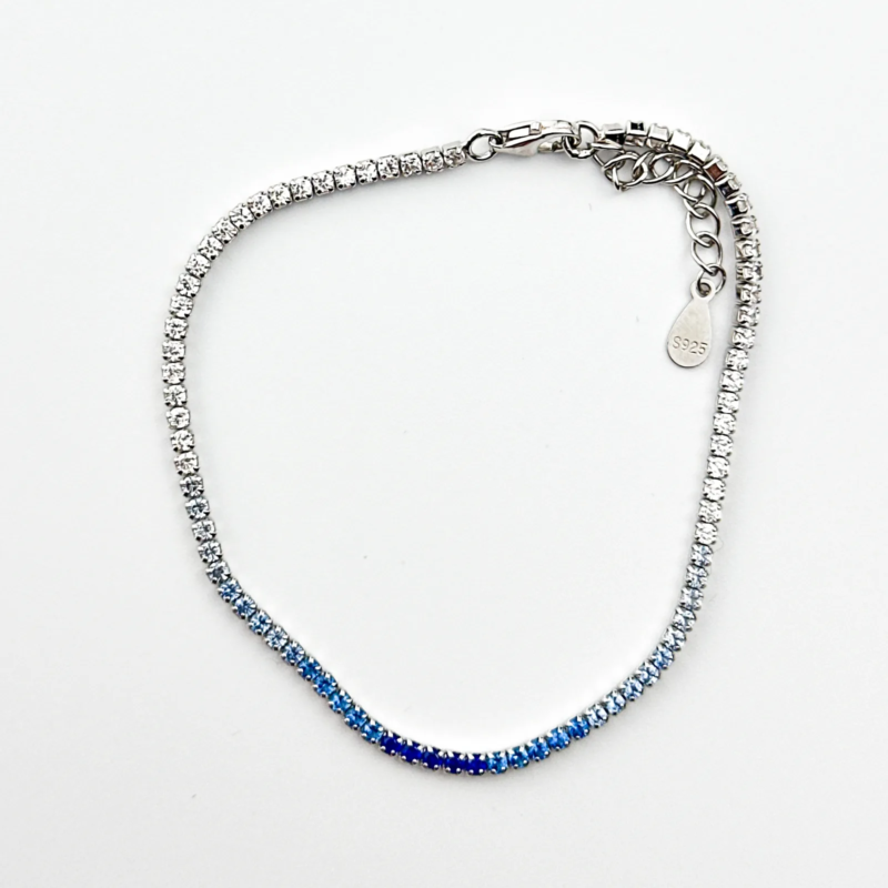 Sterling silver tennis bracelet with blue sapphire ombre, top view