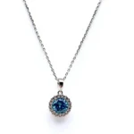 Sterling silver necklace with blue crystal pendant, front view