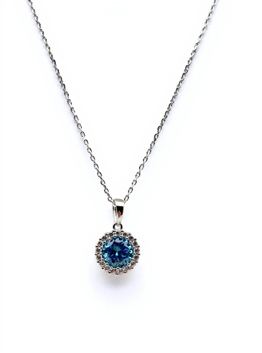 Sterling silver necklace with blue crystal pendant, front view