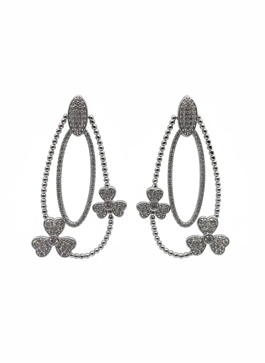 Sterling silver Irish clover dangle earrings with clover motif, front view