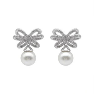 Sterling silver earrings with bow design and pearl, front view