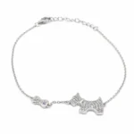 Sterling silver bracelet with dog and bone motif, front view