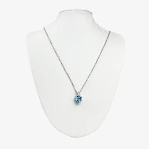 Sterling silver blue topaz heart pendant on chain, front view