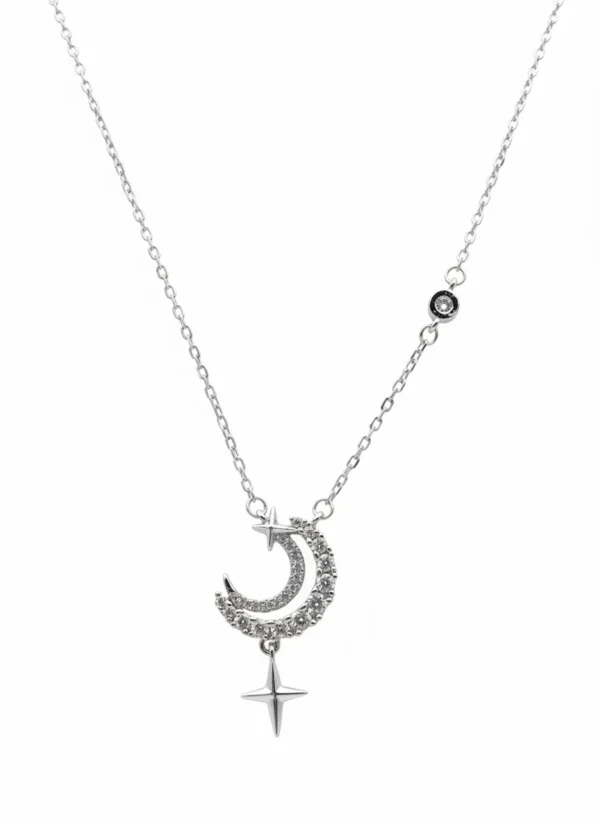 Sterling silver moon and star pendant necklace with cubic zirconia, front view