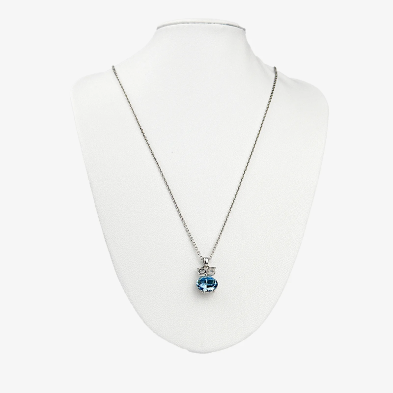 Sterling silver necklace with blue crystal pendant, front view