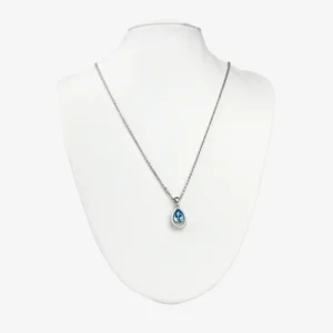 Sterling silver necklace with blue teardrop crystal pendant, front view