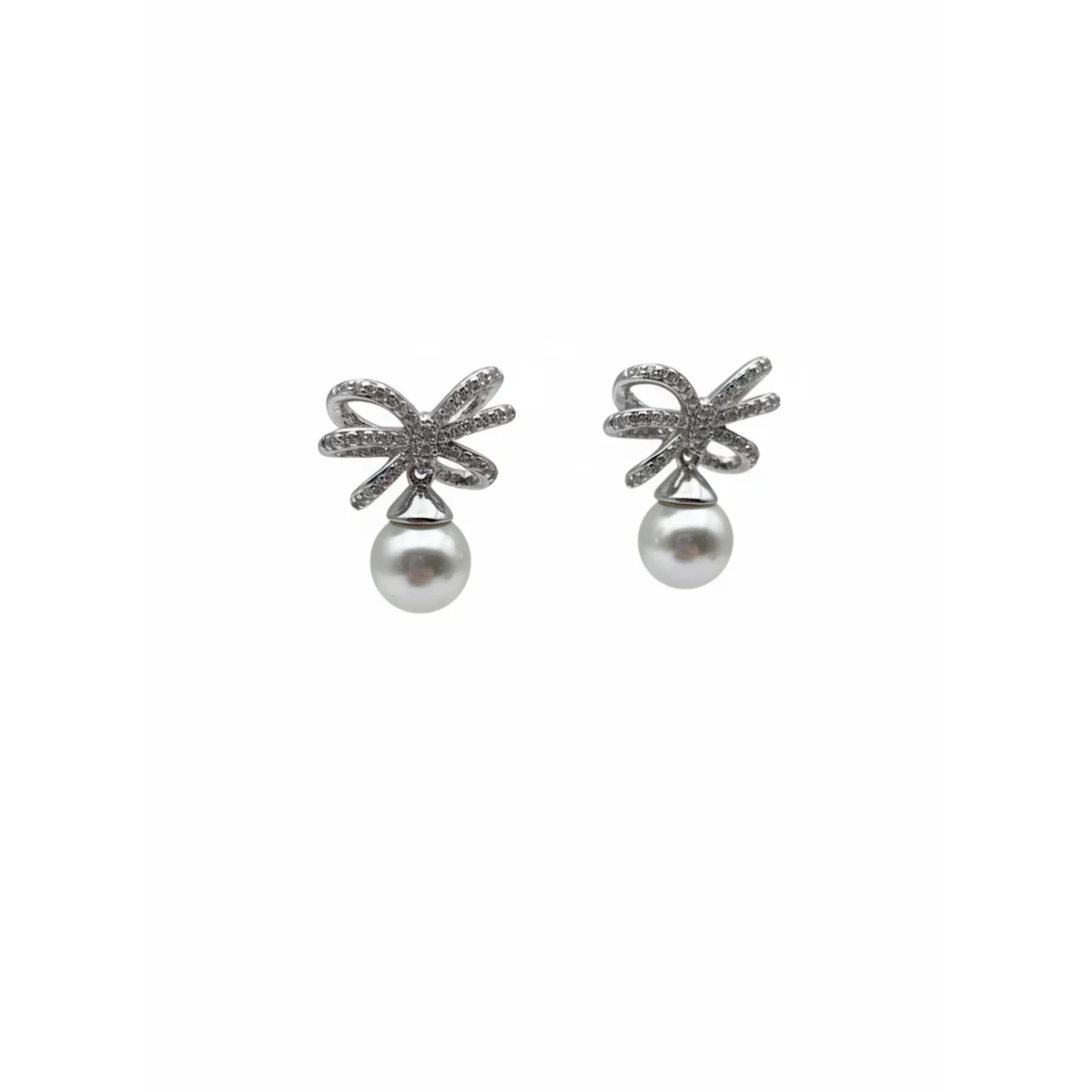 Sterling silver earrings with pearl drop and bow design, front view