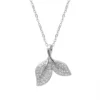 Sterling silver leaf pendant on a delicate chain, front view