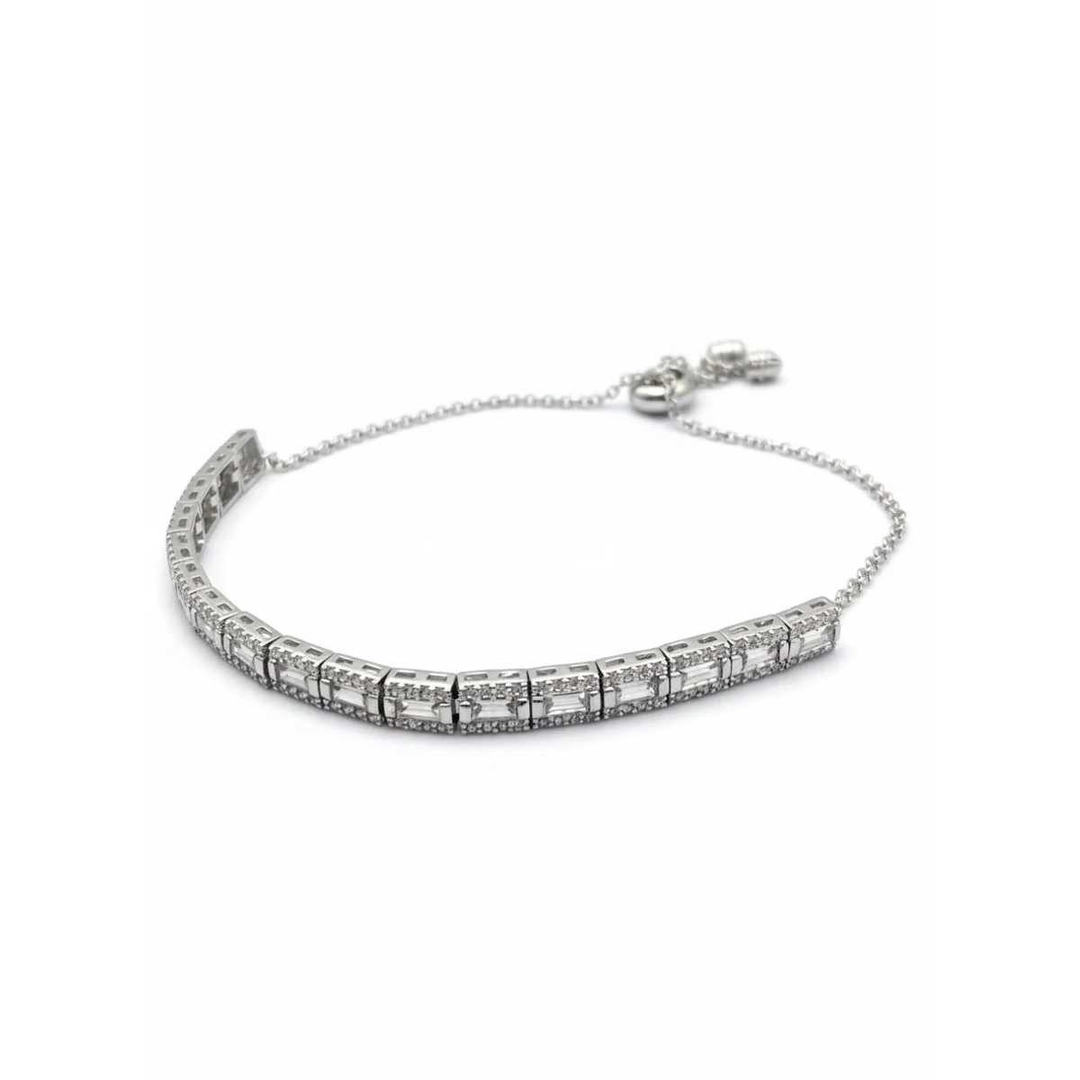Sterling silver tennis bracelet with adjustable chain, side view