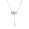 Sterling silver floral pendant necklace with cubic zirconia, front view