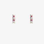 Sterling silver earrings with ruby gemstones and gold accents, front view