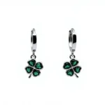 Sterling silver shamrock earrings with green gemstones, front view