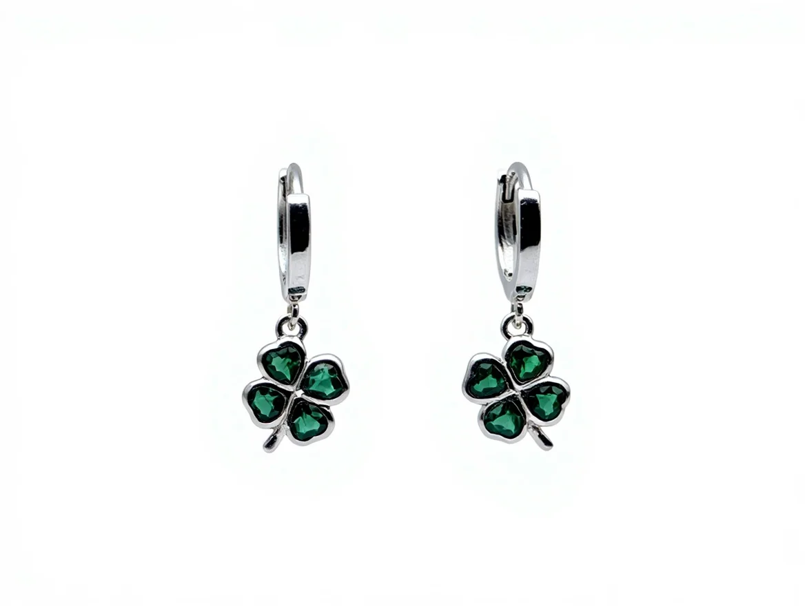 Sterling silver shamrock earrings with green gemstones, front view
