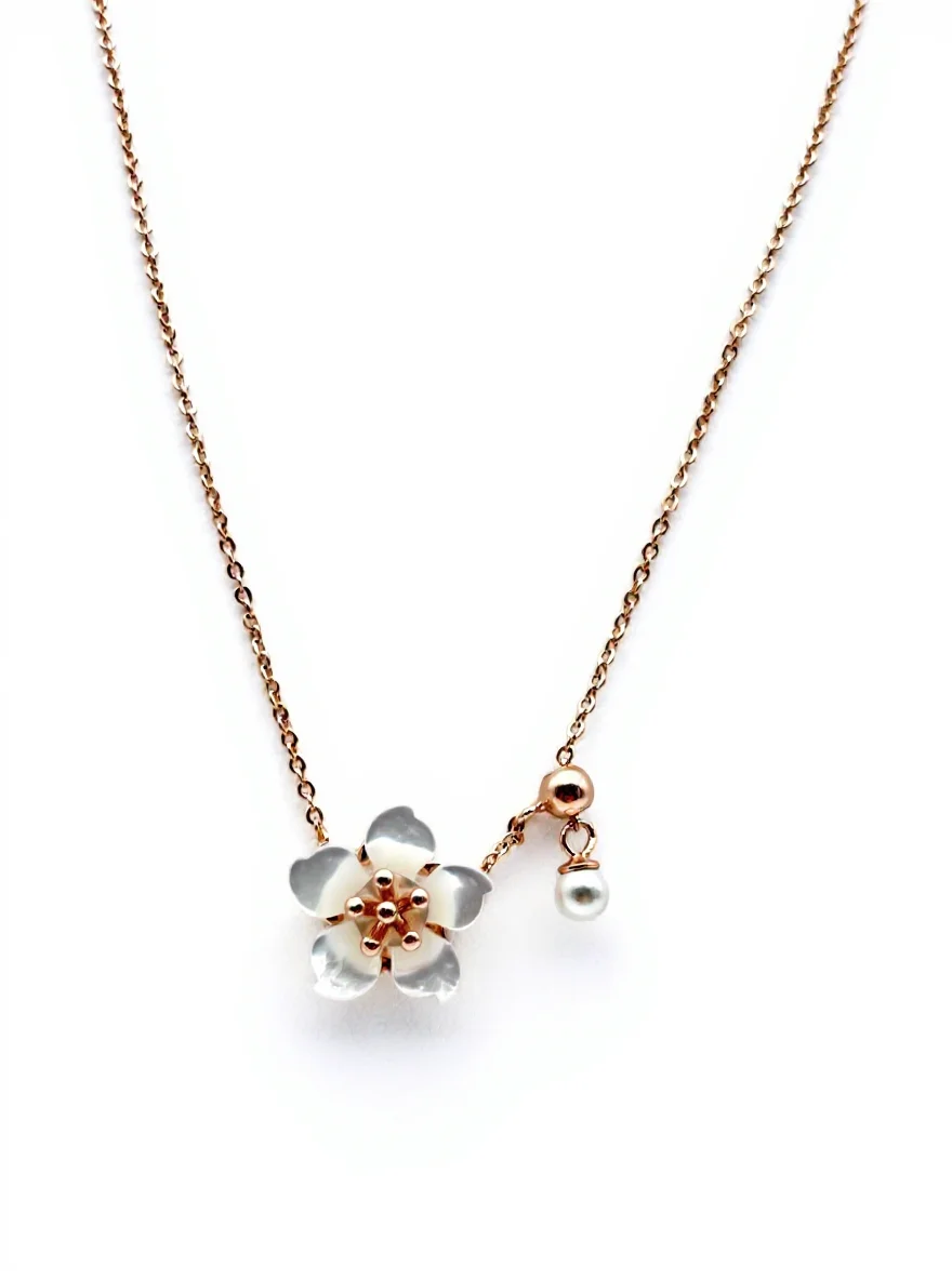 Sterling silver flower pendant necklace with pearl accent, front view