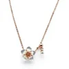 Sterling silver flower pendant necklace with pearl accent and rose gold tone, front view