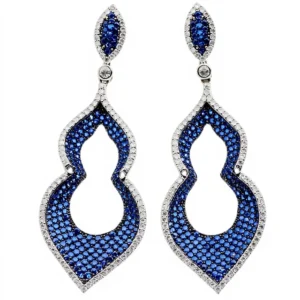 Sterling silver dangle earrings with blue gemstones, front view