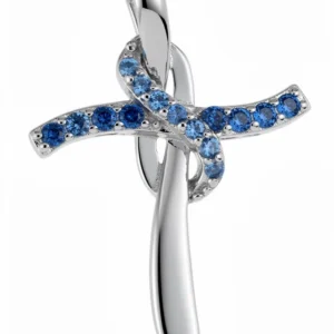 Sterling silver cross pendant with blue gemstones, front view
