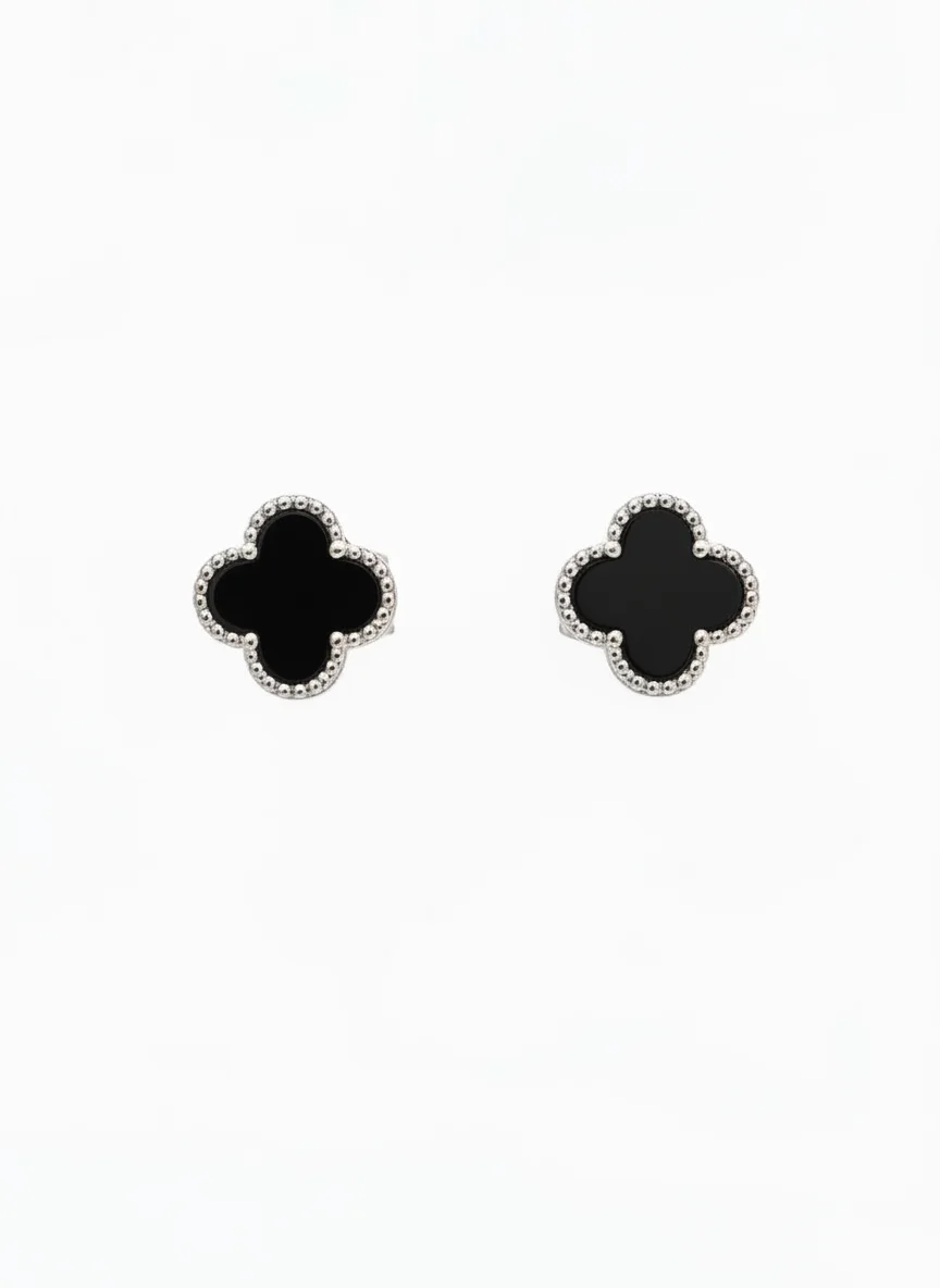 Sterling silver clover stud earrings with black enamel, front view