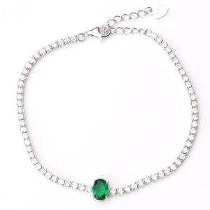 Sterling silver tennis bracelet with emerald and cubic zirconia, top view