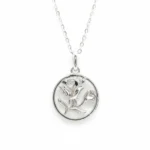 Sterling silver rose pendant on delicate chain, front view