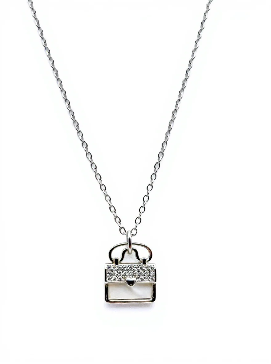 Sterling silver handbag pendant necklace with cubic zirconia, front view