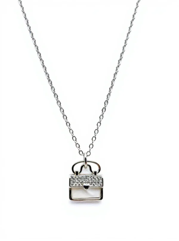 Sterling silver handbag pendant necklace with cubic zirconia, front view