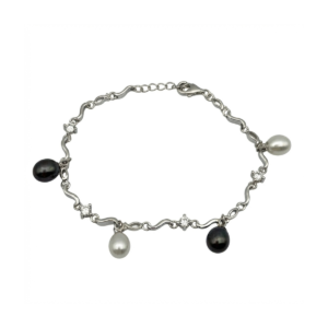 Sterling silver wave bracelet with black and white pearls, top view
