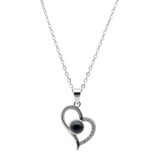 Sterling silver heart pendant with black onyx and stones, front view