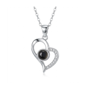Sterling silver heart pendant with black onyx and stones, front view