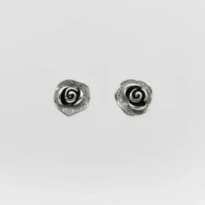Sterling silver rose stud earrings with intricate design, front view