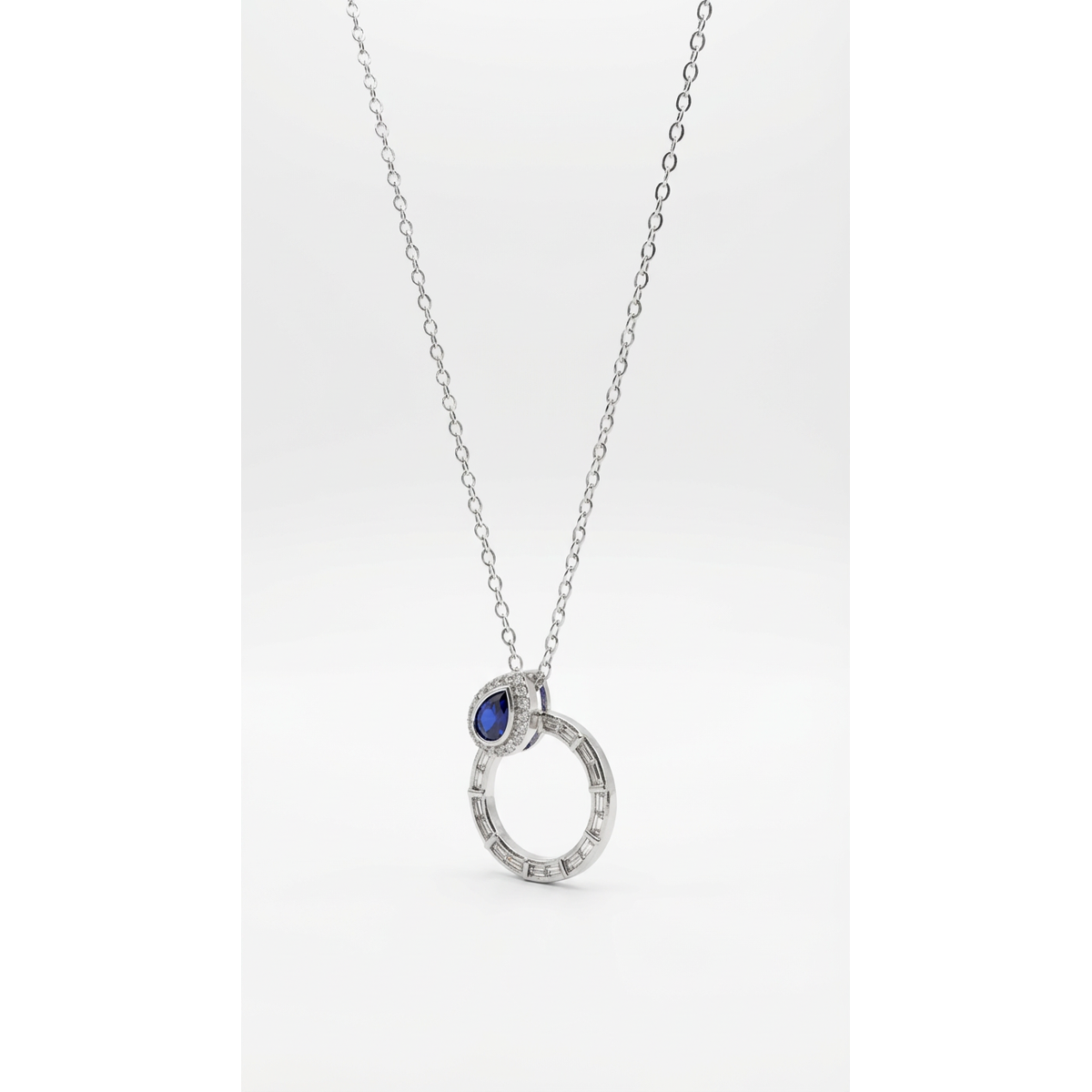 Sterling silver necklace with blue stone pendant, front view