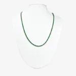 Sterling silver necklace with emerald stones, front view