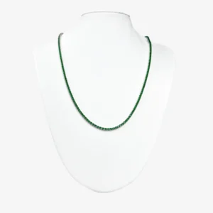 Sterling silver necklace with emerald stones, front view