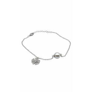 Sterling silver bracelet with clover charm and pearl, side view