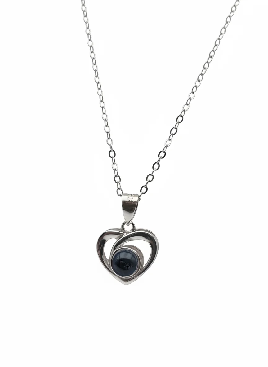 Sterling silver heart pendant necklace with black stone, front view